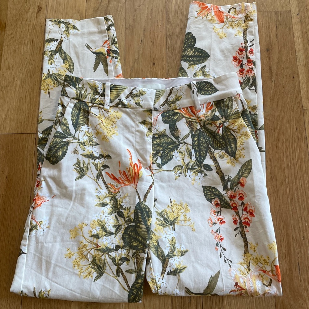 H&M White Floral Print Pants with Green and Orange Accents